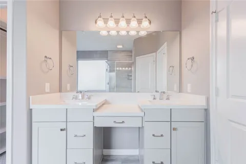 a bathroom with a sink a toilet and a bathtub