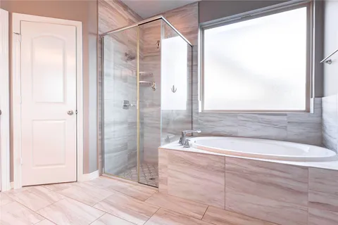 a bathroom with a sink a toilet and a bathtub