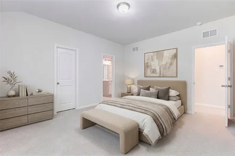 a kitchen with kitchen island a sink stainless steel appliances and cabinets