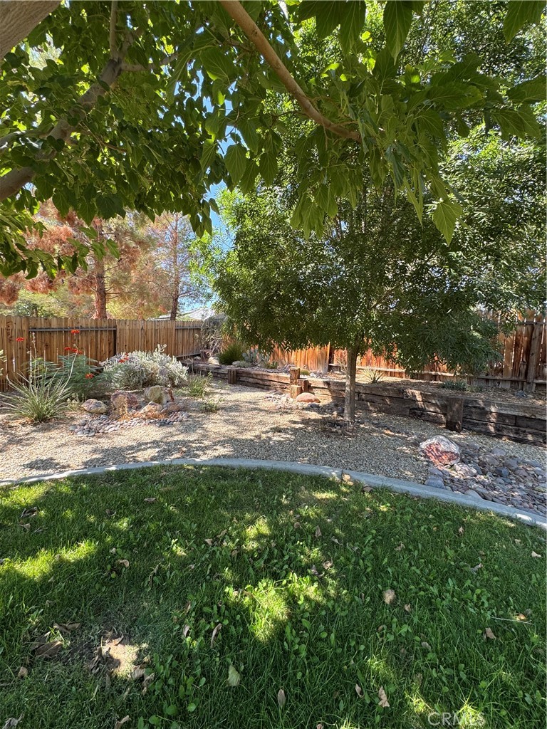 209 Kimberly Lane Ridgecrest, CA 93555 - Photo 7 of 62 a view of green field