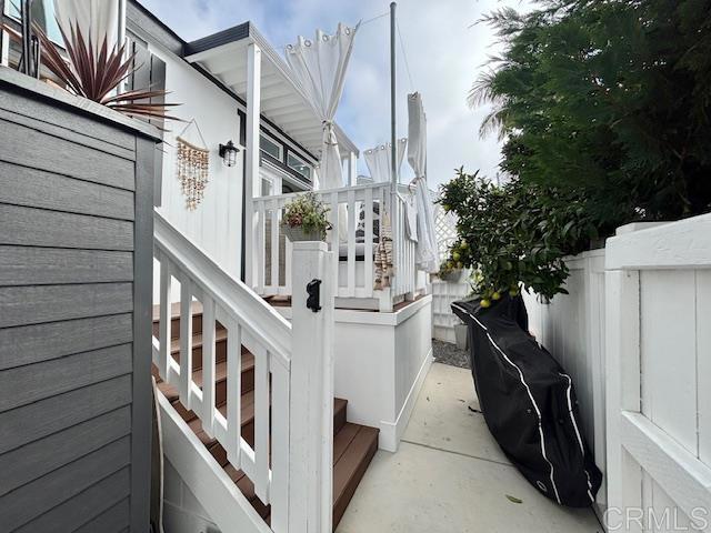 699 North Vulcan Avenue, Unit 80 Encinitas, CA 92024 - Photo 4 of 27 a view of a house with backyard and deck