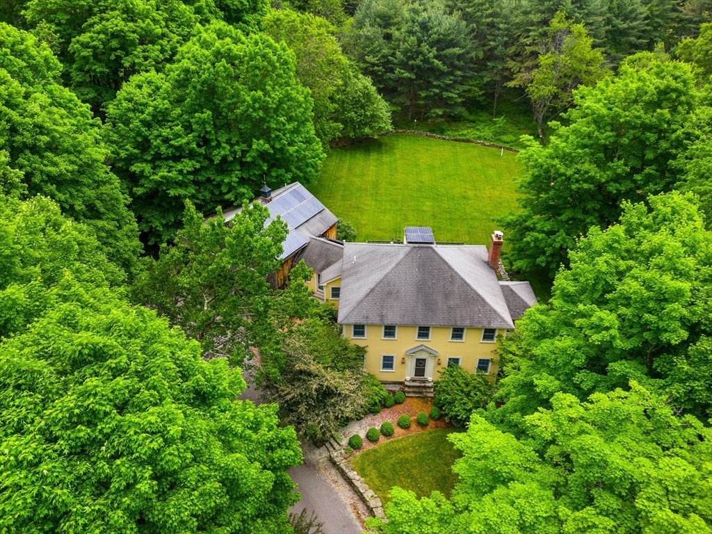 338 Pond Street Dunstable, MA 01827 - Photo 1 of 42 an aerial view of a house with yard swimming pool and outdoor seating