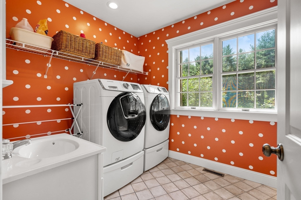 338 Pond Street Dunstable, MA 01827 - Photo 19 of 42 a utility room with dryer and washer