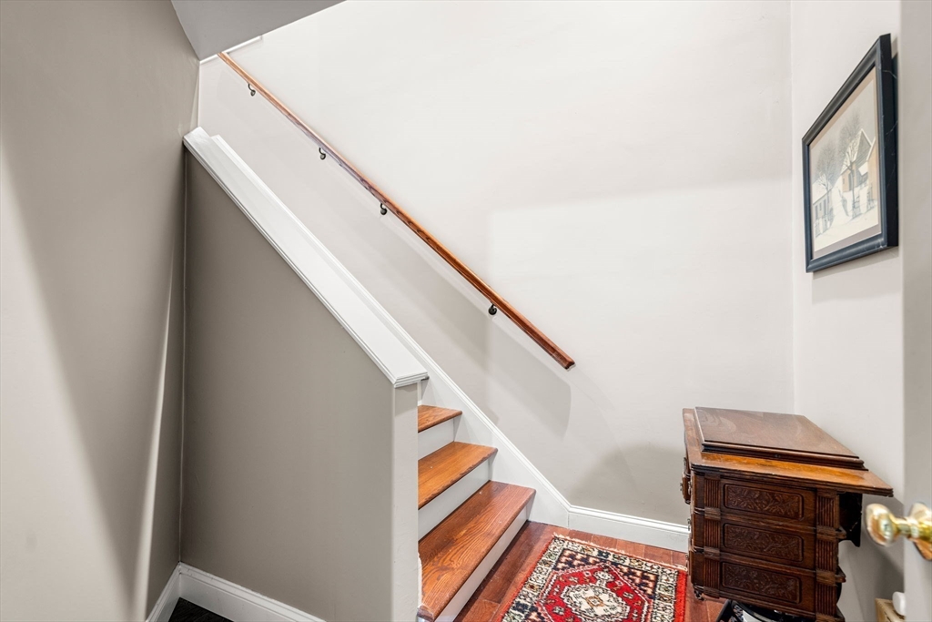 338 Pond Street Dunstable, MA 01827 - Photo 31 of 42 a balcony with wooden floor and stairs