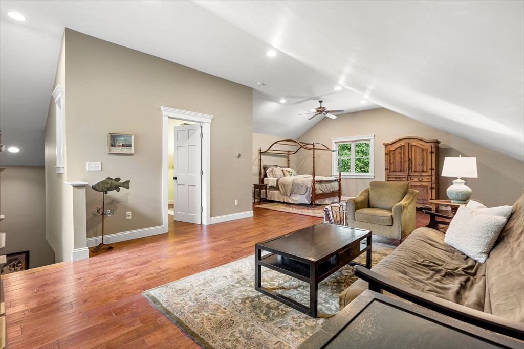 338 Pond Street Dunstable, MA 01827 - Photo 32 of 42 a living room with furniture and wooden floor