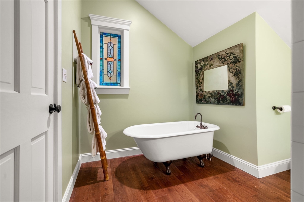 338 Pond Street Dunstable, MA 01827 - Photo 34 of 42 a bathroom with a toilet a sink and mirror