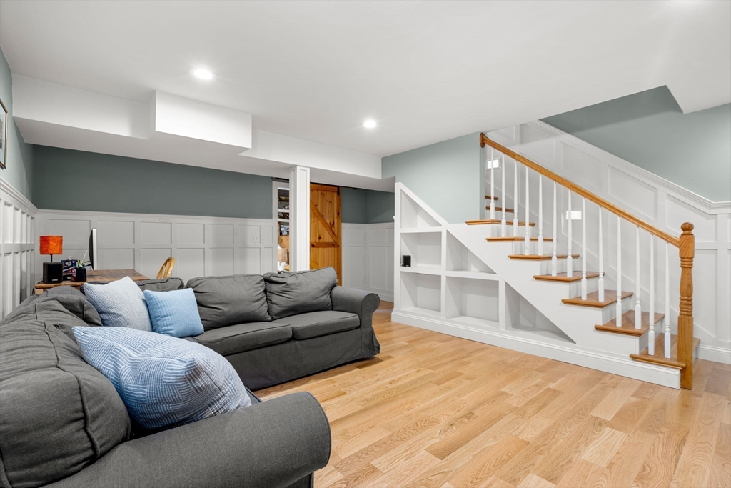 338 Pond Street Dunstable, MA 01827 - Photo 35 of 42 a living room with furniture and stairs