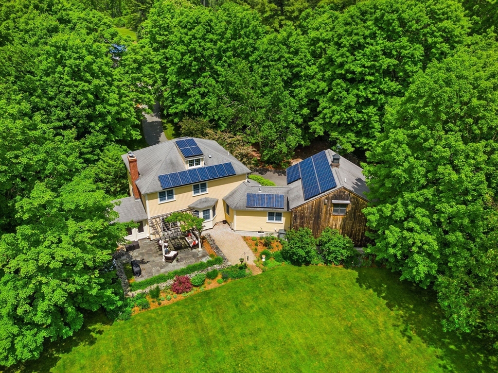 338 Pond Street Dunstable, MA 01827 - Photo 37 of 42 an aerial view of a house with a yard basket ball court and outdoor seating