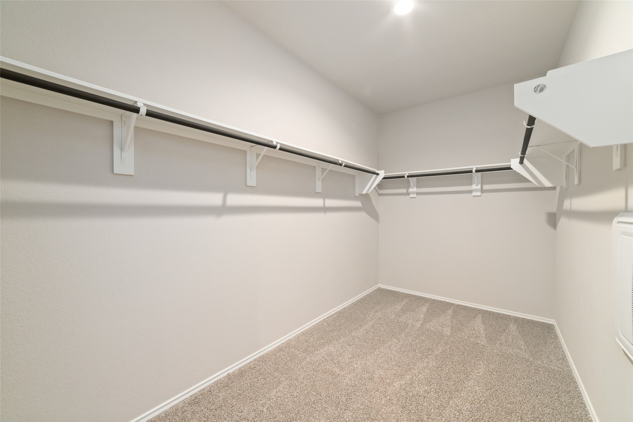 23702 Harrow Field Ln Spring Spring, TX 77373 - Photo 20 of 32 a view of an empty walk in closet