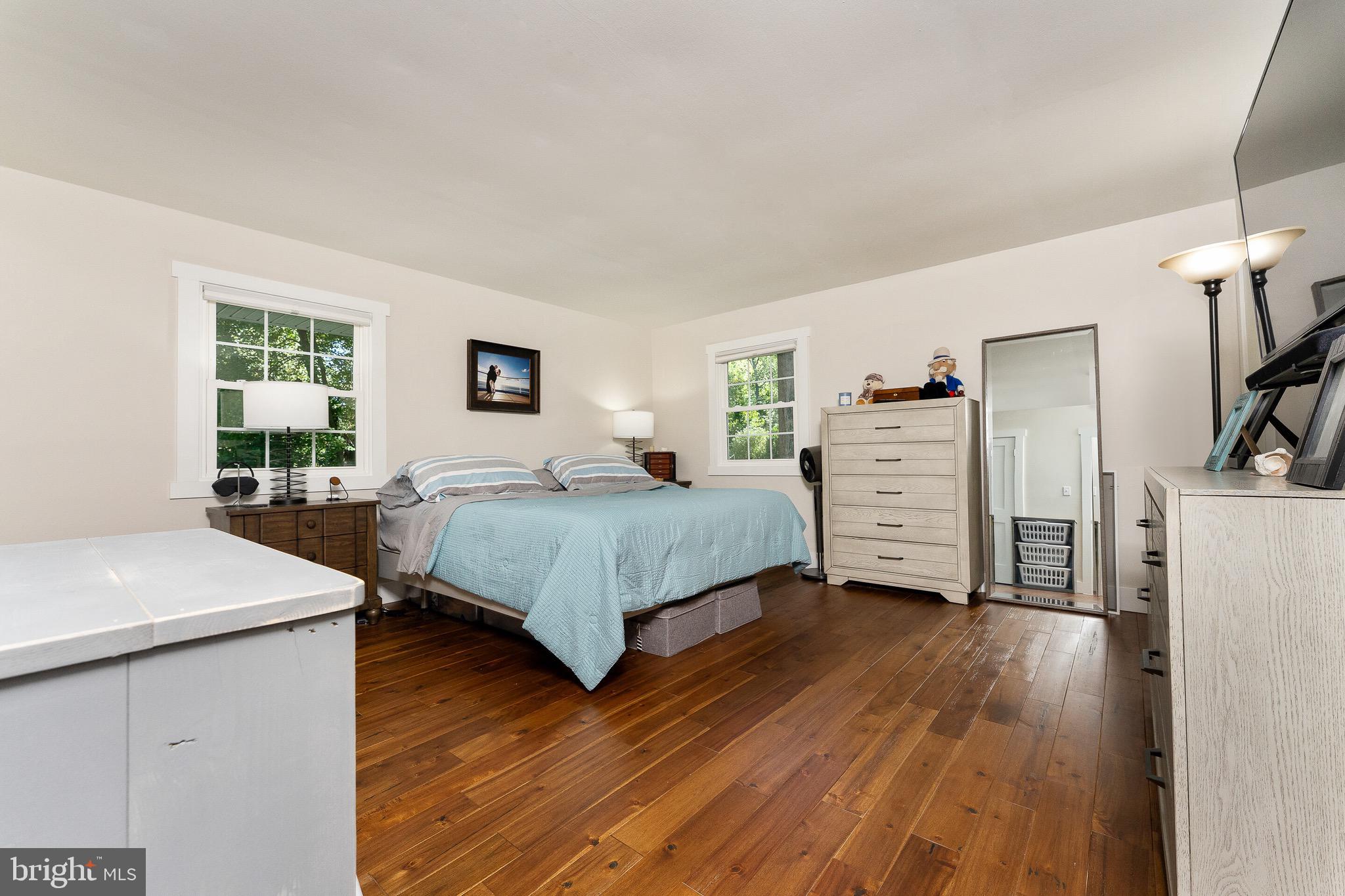 2425 Hunter Mill Road Vienna, VA 22181 - Photo 12 of 28 a bedroom with a bed and a dresser