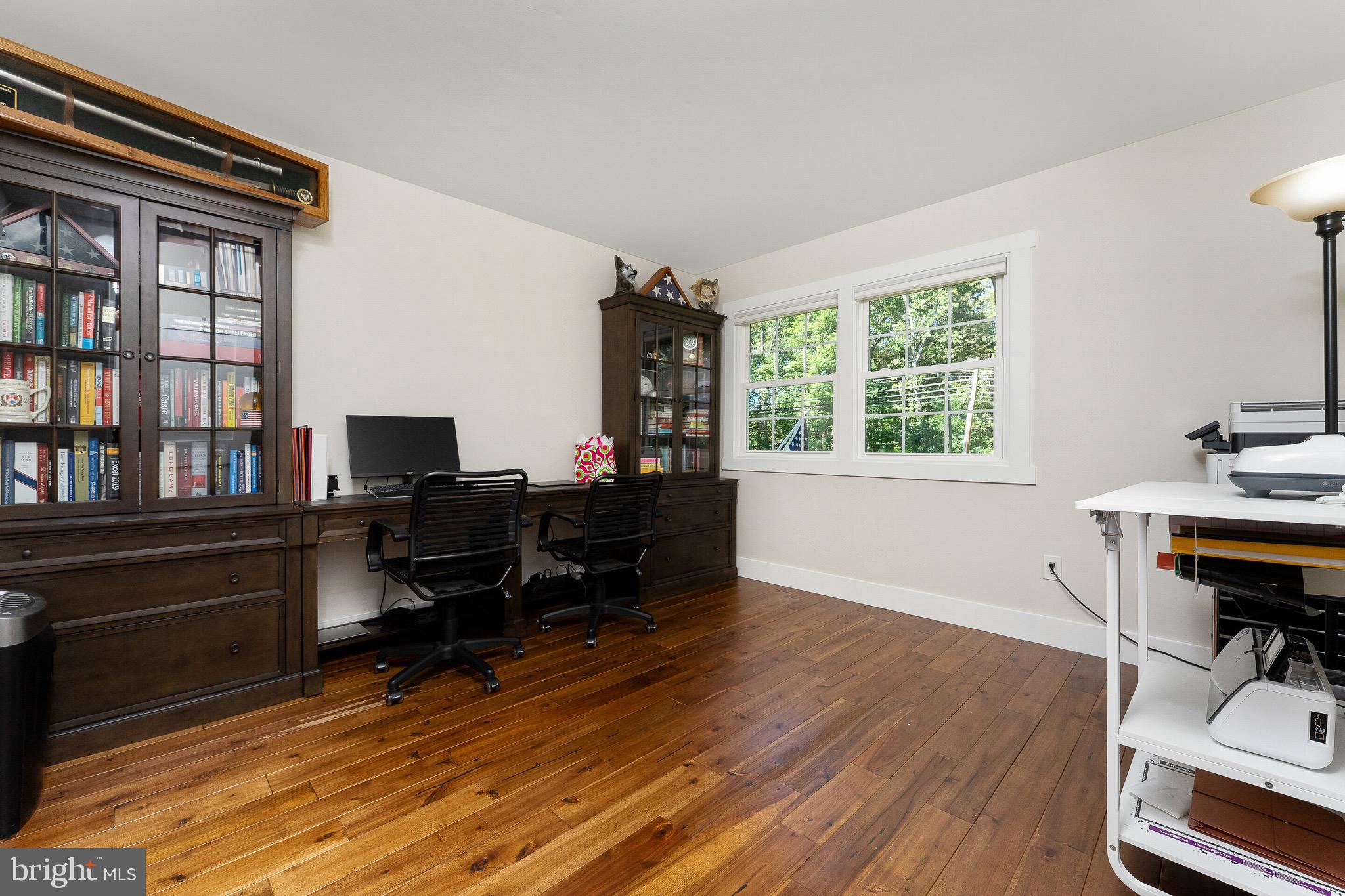 2425 Hunter Mill Road Vienna, VA 22181 - Photo 18 of 28 a view of a workspace with furniture and a window