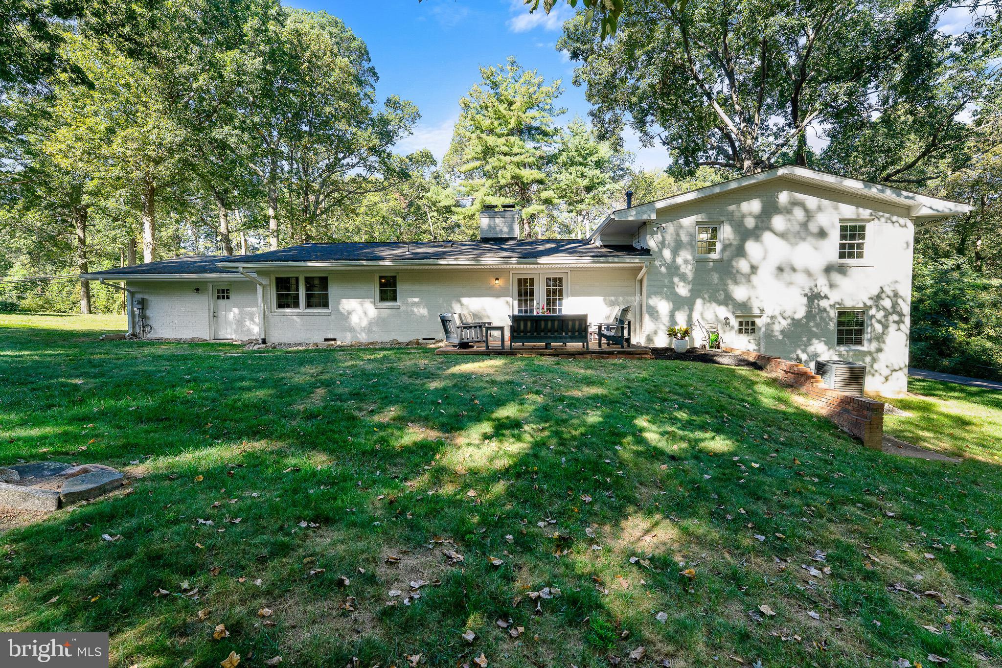 2425 Hunter Mill Road Vienna, VA 22181 - Photo 28 of 28 a view of a house with a yard