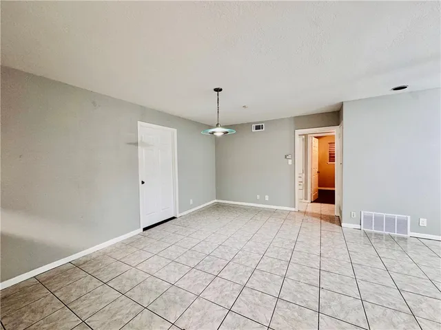 a view of an empty room with window