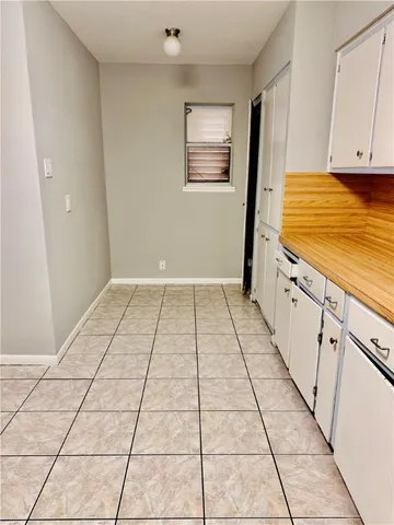 a view of a kitchen with white appliances