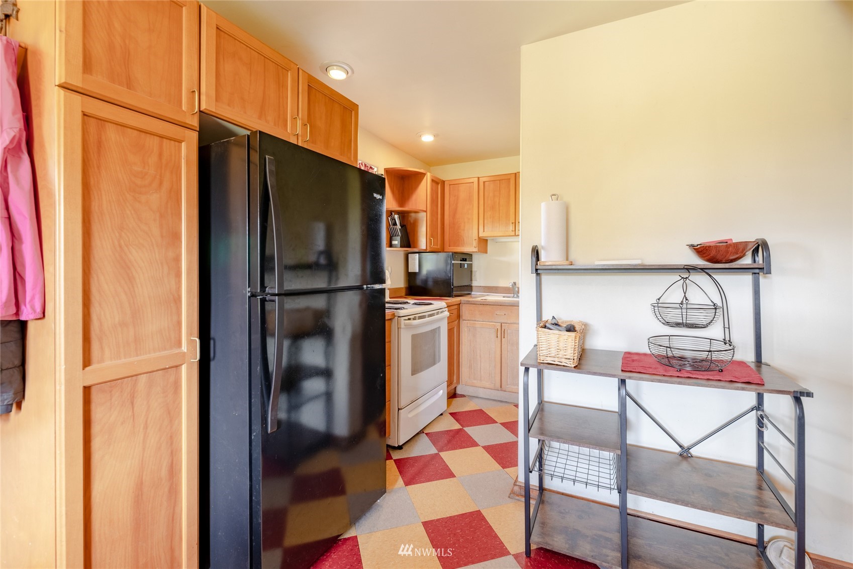 14202 Mima Road Southwest Olympia, WA 98512 - Photo 11 of 40 a kitchen with stainless steel appliances granite countertop a refrigerator and a sink