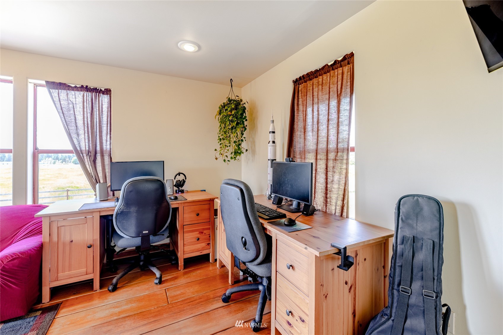 14202 Mima Road Southwest Olympia, WA 98512 - Photo 16 of 40 a view of a workspace with furniture and a window