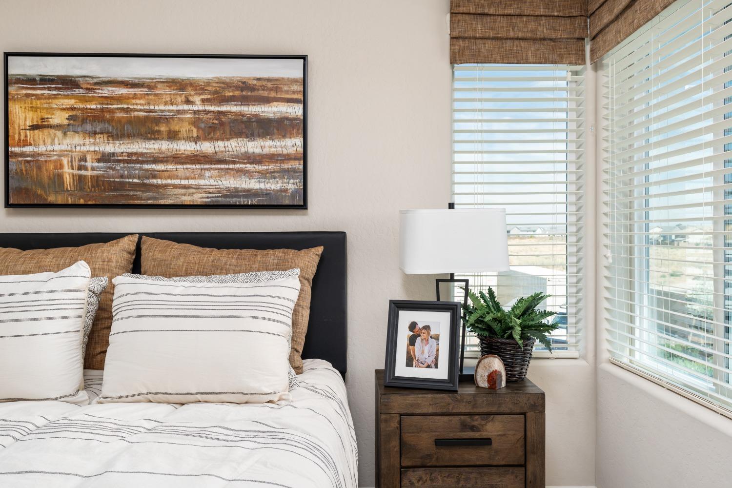 1116 Elevations Way West Madera, CA 93636 - Photo 17 of 20 a bedroom with a bed and a window