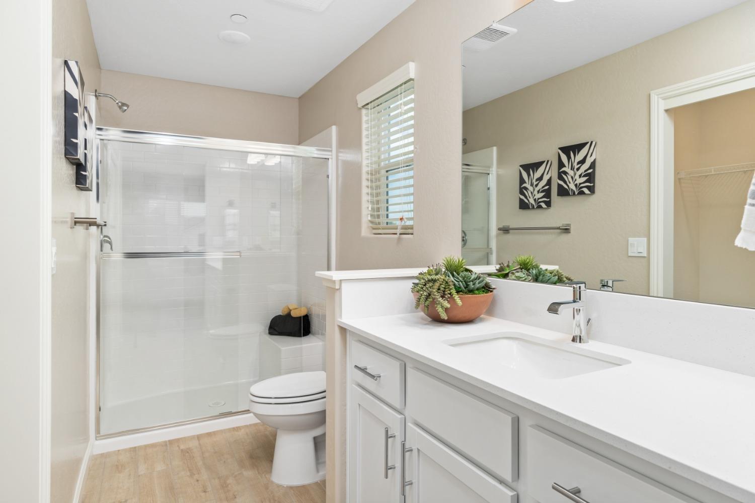 1116 Elevations Way West Madera, CA 93636 - Photo 18 of 20 a bathroom with a sink a toilet and shower
