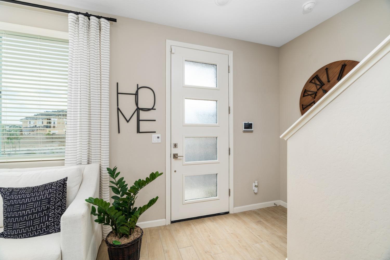 1116 Elevations Way West Madera, CA 93636 - Photo 2 of 20 a view of entryway with wooden floor