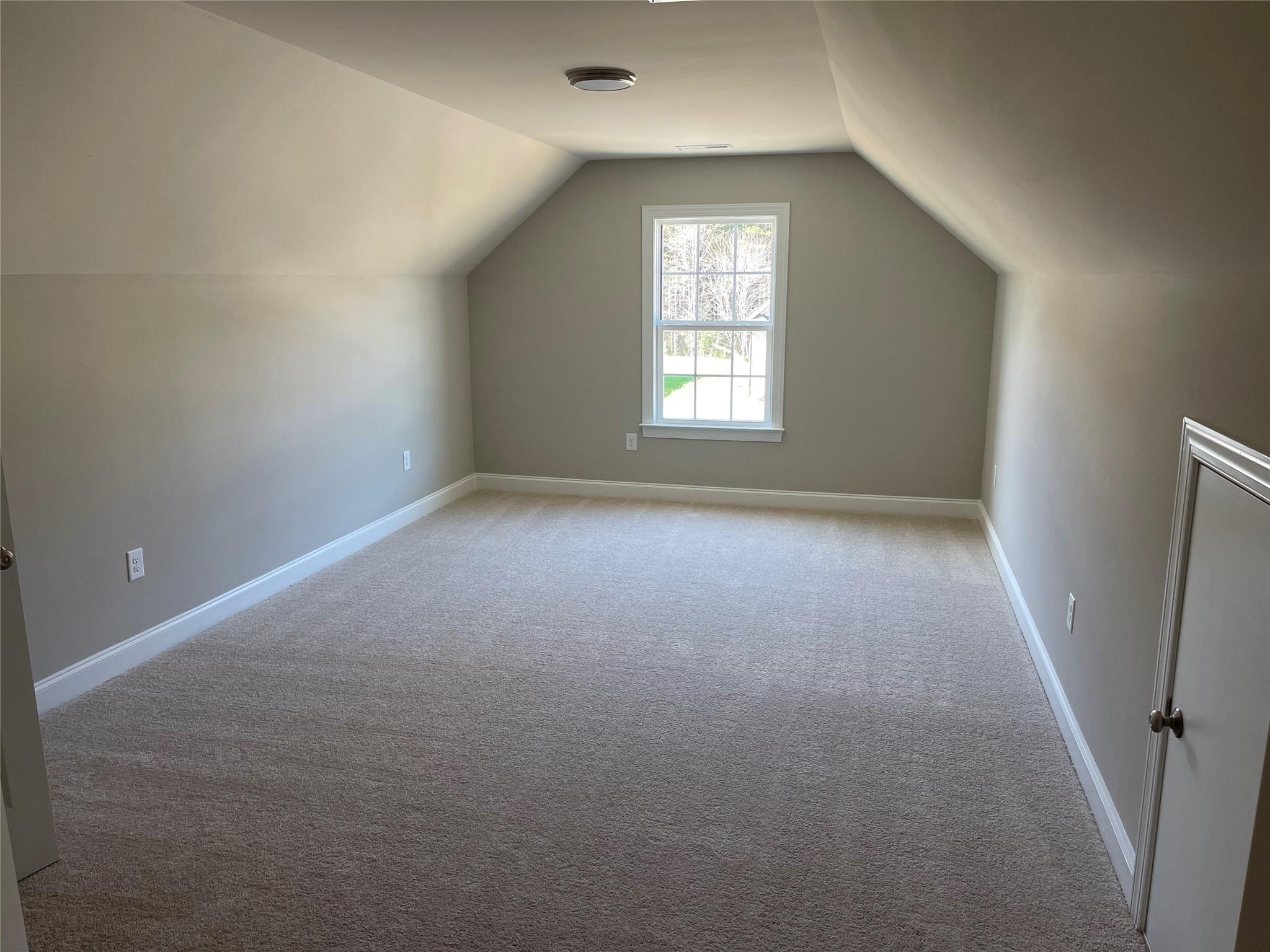 639 Church Street, Unit 99 Locust, NC 28097 - Photo 11 of 11 an empty room with windows and closet