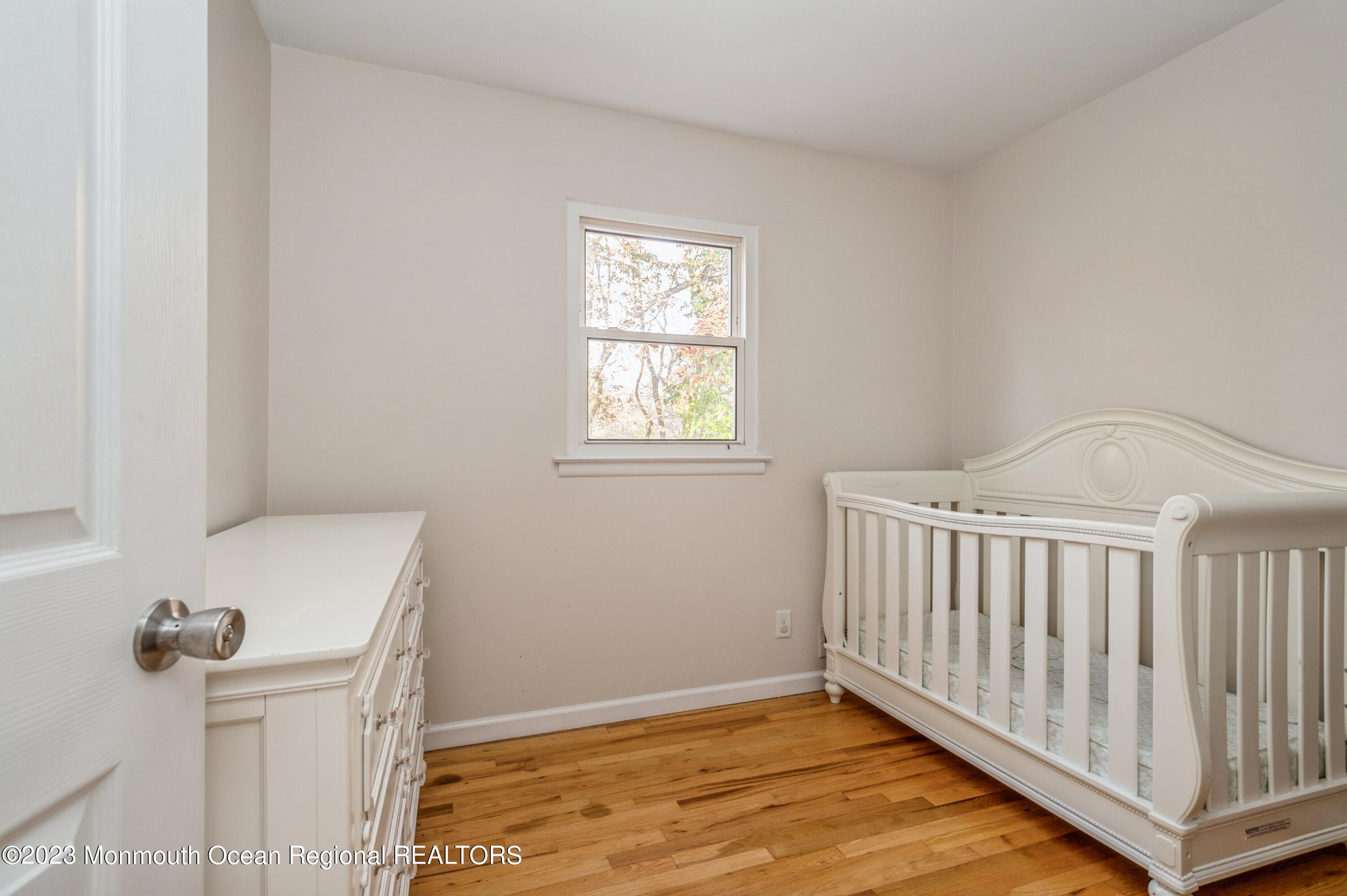 121 Darien Road Howell, NJ 07731 - Photo 12 of 19 a view of an empty room with a window