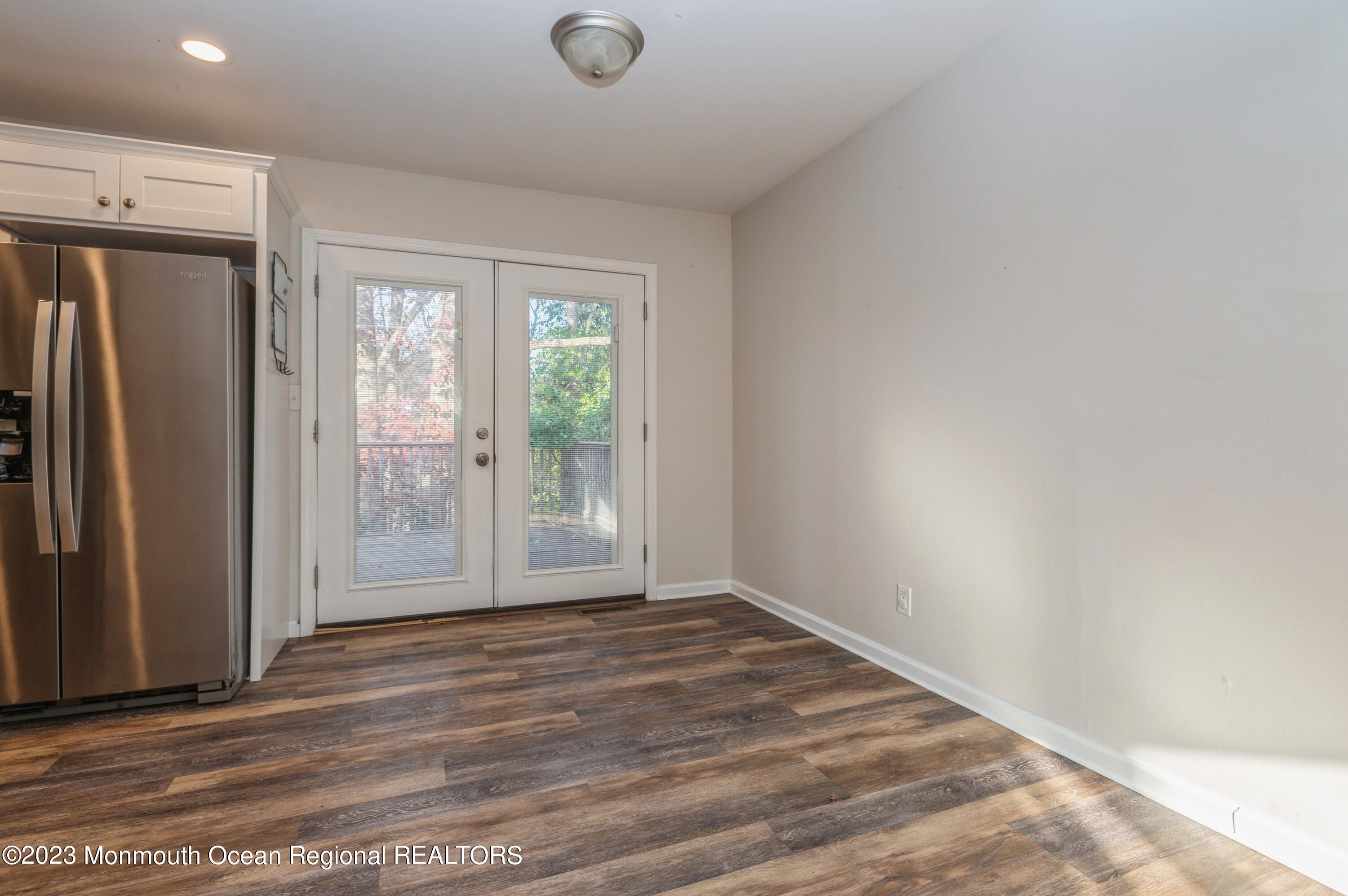 121 Darien Road Howell, NJ 07731 - Photo 5 of 19 a view of an empty room with a window