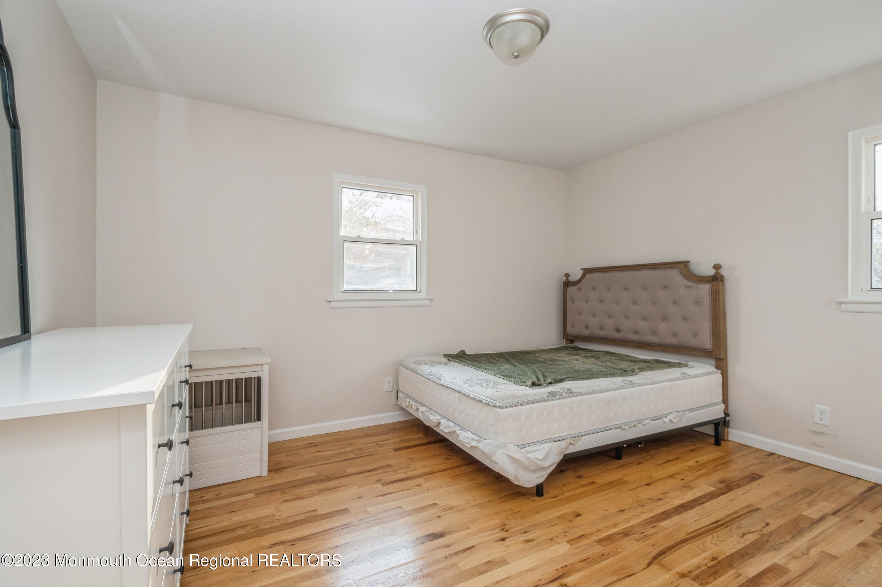 121 Darien Road Howell, NJ 07731 - Photo 10 of 19 a bedroom with a bed and a window