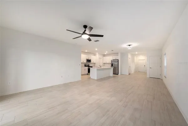 a view of a livingroom with a ceiling fan