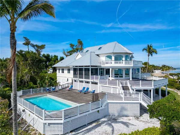 a front view of a house with swimming pool