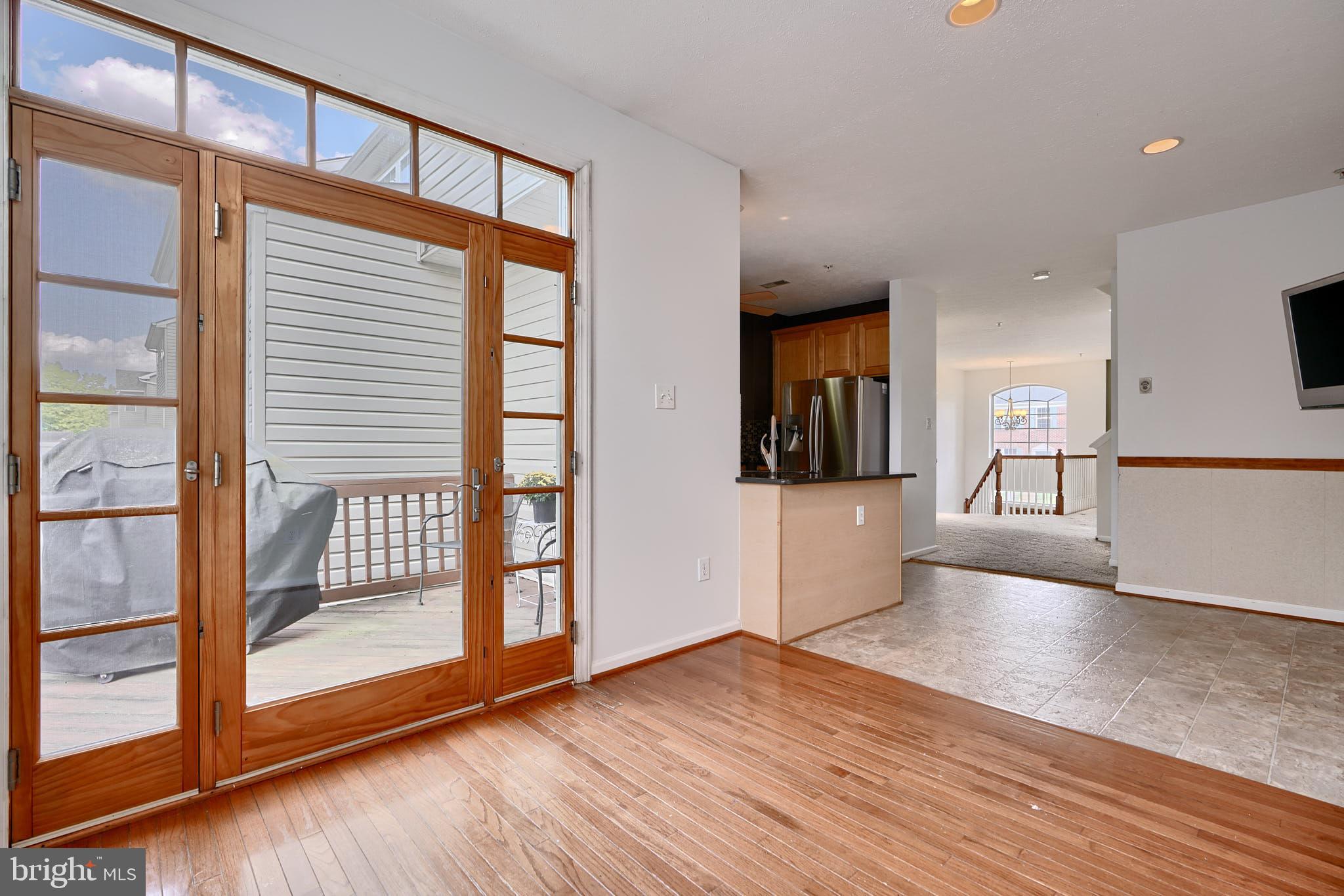 276 Cherry Tree Square Forest Hill, MD 21050 - Photo 18 of 61 Rich wood trim door w/ transoms that open