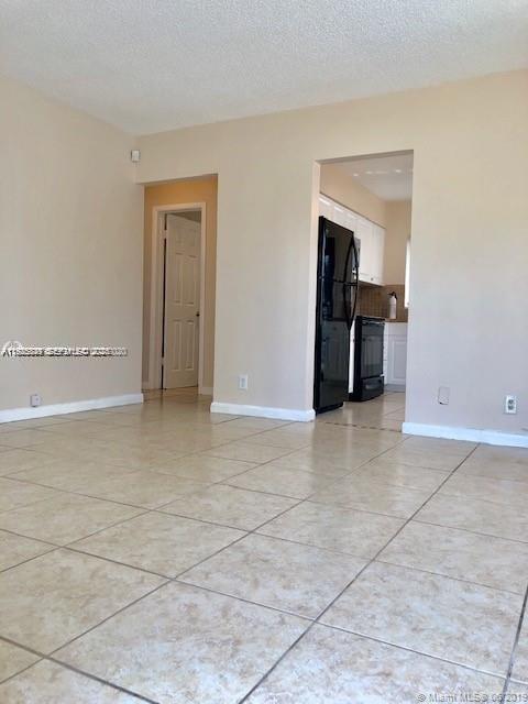 1064 Southwest 2nd Street, Unit 1 Hallandale Beach, FL 33009 - Photo 7 of 14 a view of an empty room