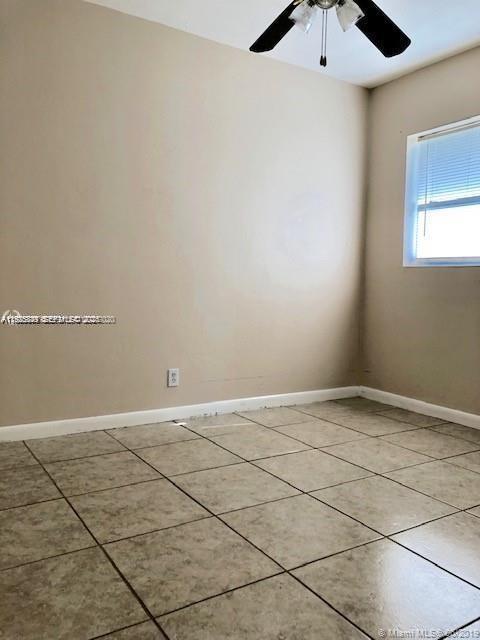 1064 Southwest 2nd Street, Unit 1 Hallandale Beach, FL 33009 - Photo 9 of 14 a view of an empty room