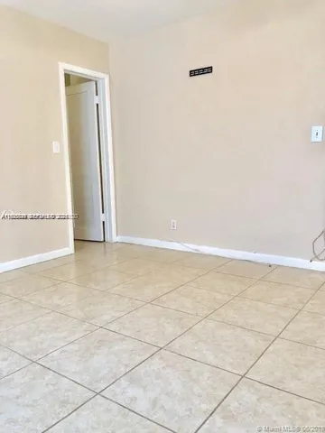 an empty room with a natural light