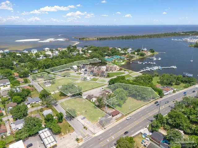 a view of a city with an ocean