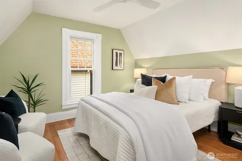 a bedroom with bed and window