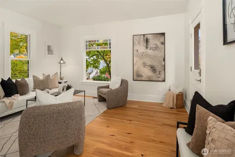 a bedroom with a large bed and a couch