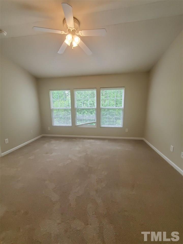 8208 Clasara Circle Raleigh, NC 27613 - Photo 11 of 26 an empty room with a window