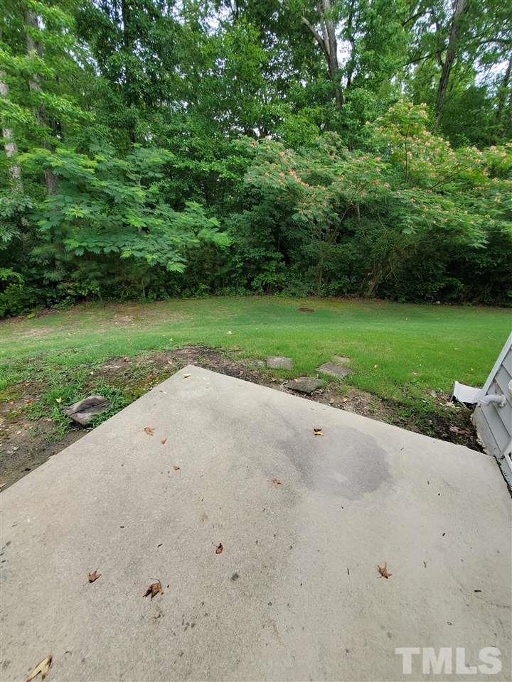 8208 Clasara Circle Raleigh, NC 27613 - Photo 26 of 26 a view of a park with a trees in the background