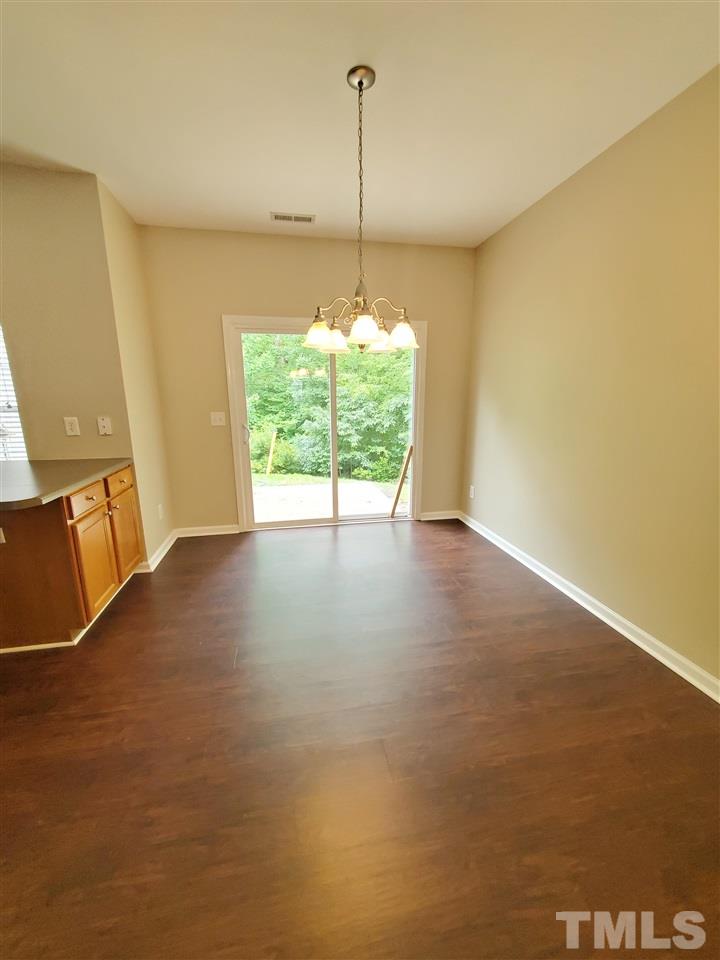 8208 Clasara Circle Raleigh, NC 27613 - Photo 10 of 26 a view of a room with window