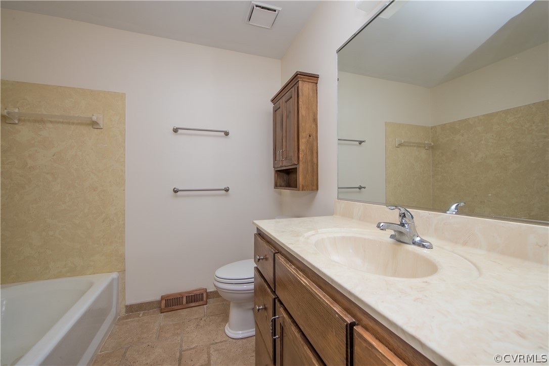 6400 Qualla Road Chesterfield, VA 23832 - Photo 28 of 36 a bathroom with a sink toilet and shower