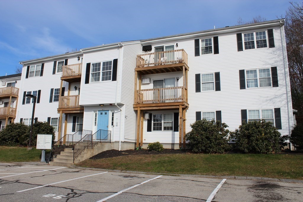 36 C Gibbs Street, Unit 29 Worcester, MA 01607 - Photo 2 of 25 a front view of a house with garden