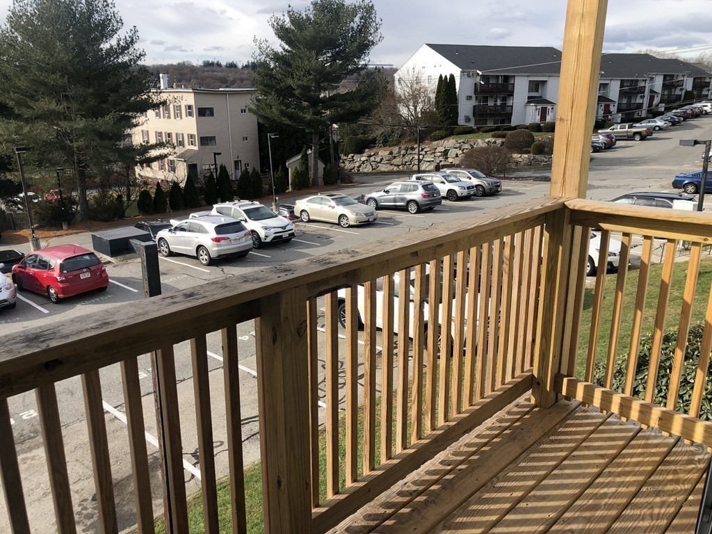 36 C Gibbs Street, Unit 29 Worcester, MA 01607 - Photo 24 of 25 a outdoor view of a house with a patio