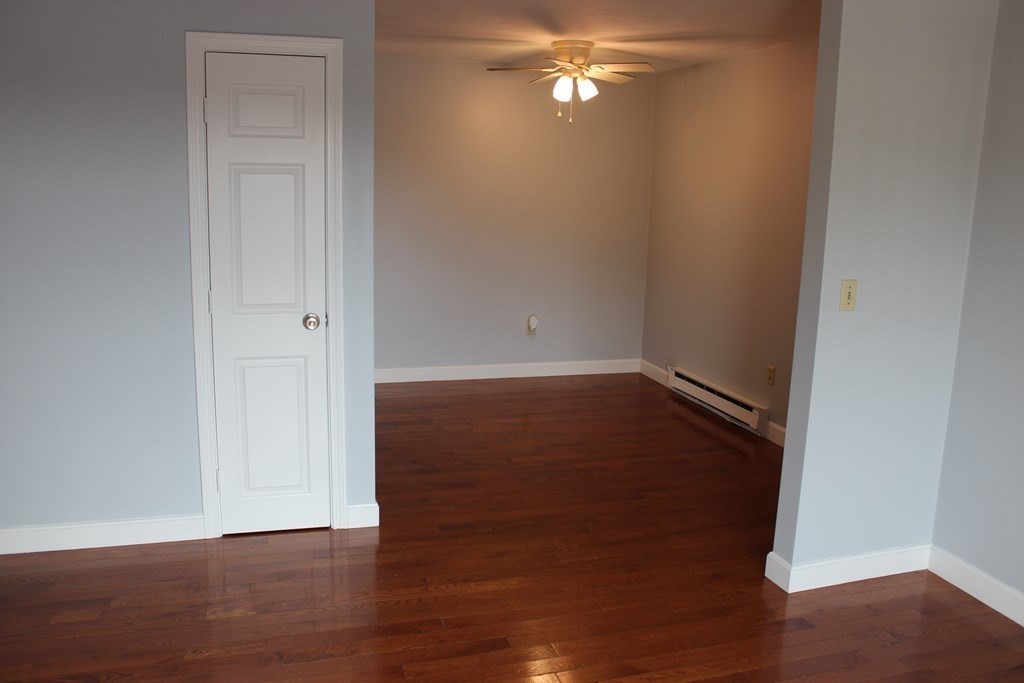 36 C Gibbs Street, Unit 29 Worcester, MA 01607 - Photo 9 of 25 a view of empty room with wooden floor