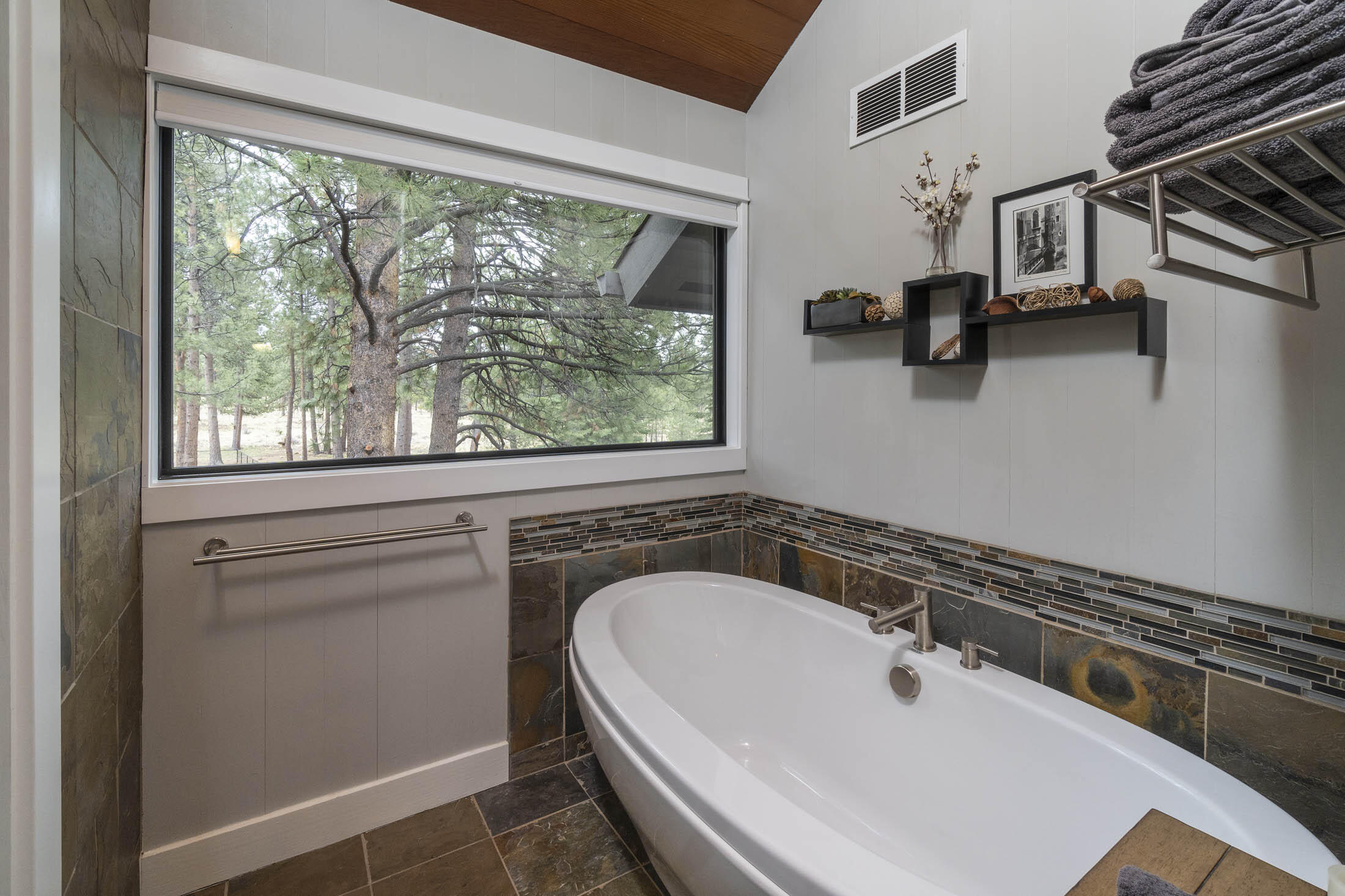 60010 East Ridgeview Drive Bend, OR 97702 - Photo 18 of 43 a bathroom with a sink and a window