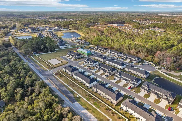 an aerial view of city and mountain view in back