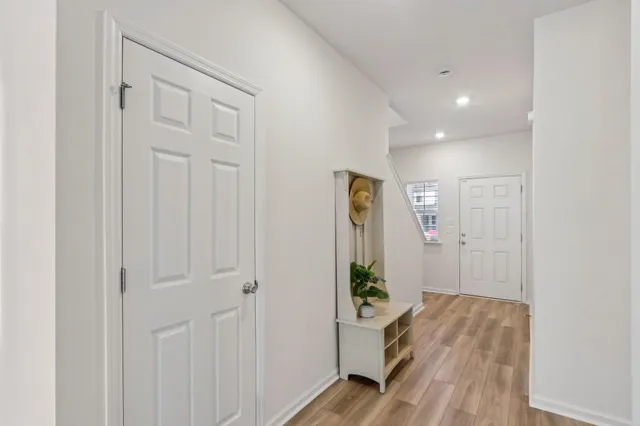 a view of entryway with wooden floor