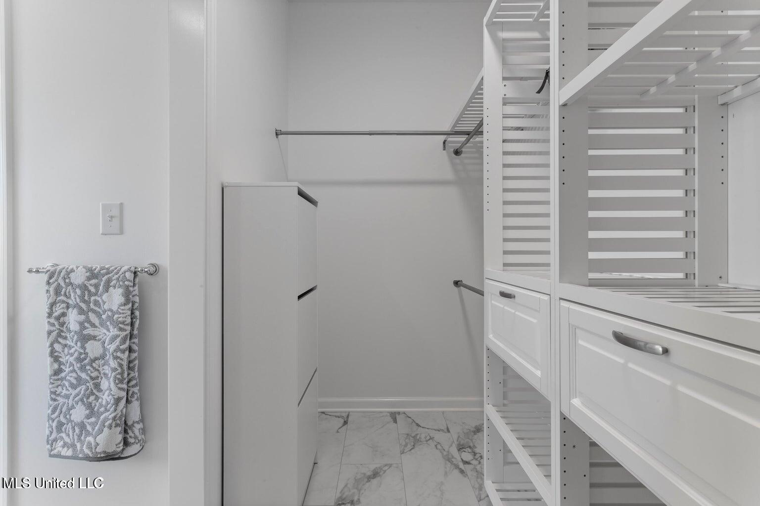 87001 Beaux Vue Court Diamondhead, MS 39525 - Photo 19 of 32 20 Primary Closet