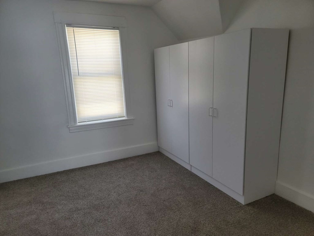 71 Paine Street Worcester, MA 01605 - Photo 19 of 20 an empty room with windows