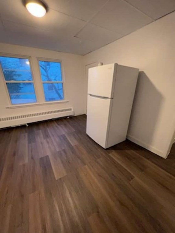 71 Paine Street Worcester, MA 01605 - Photo 8 of 20 a view of a kitchen with wooden floor