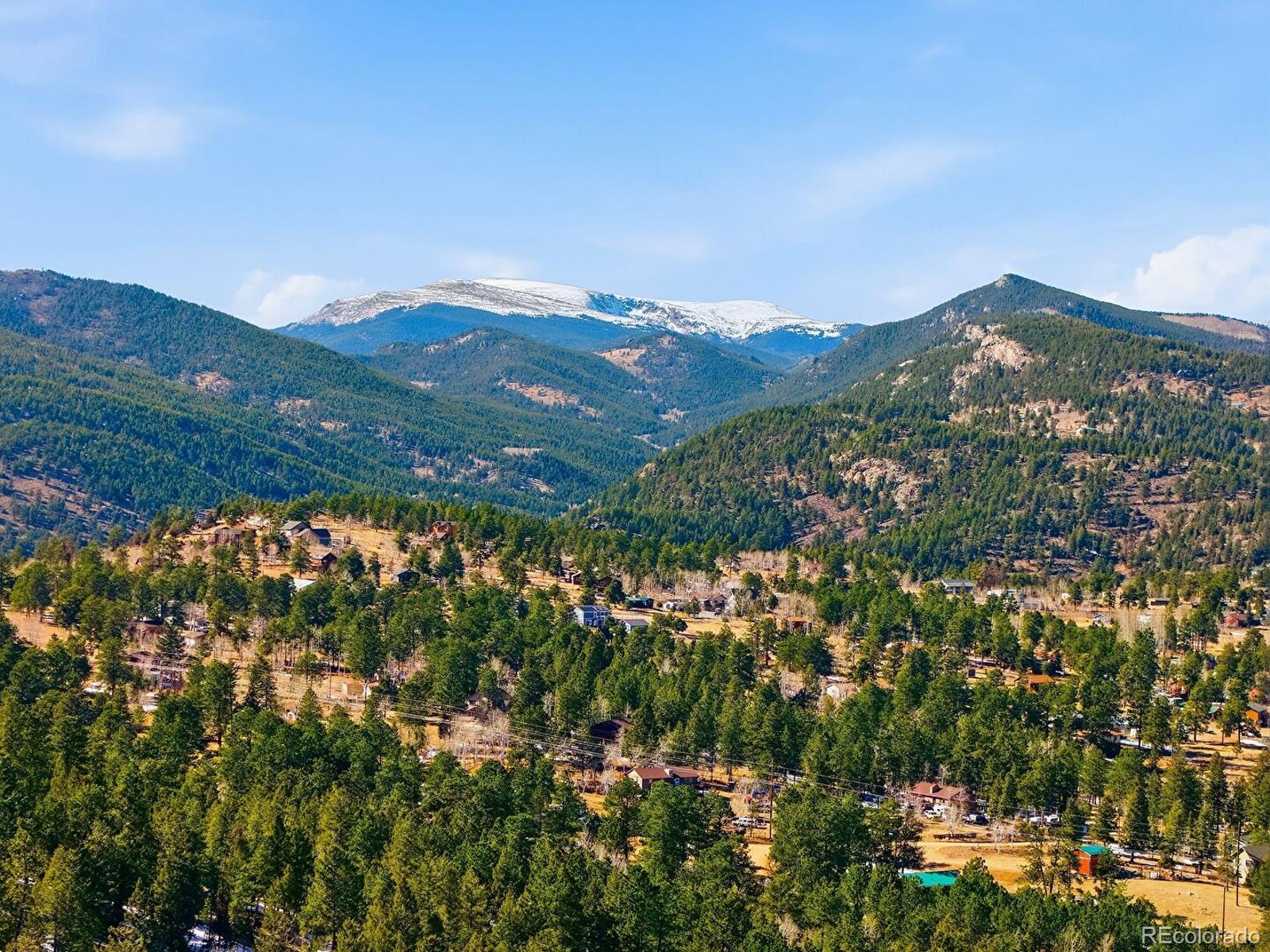 399 Conifer Drive Bailey, CO 80421 - Photo 20 of 42 a view of a city with a mountain